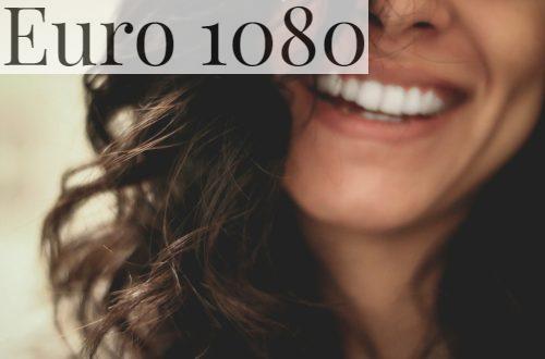 long black haired woman smiling close-up photography